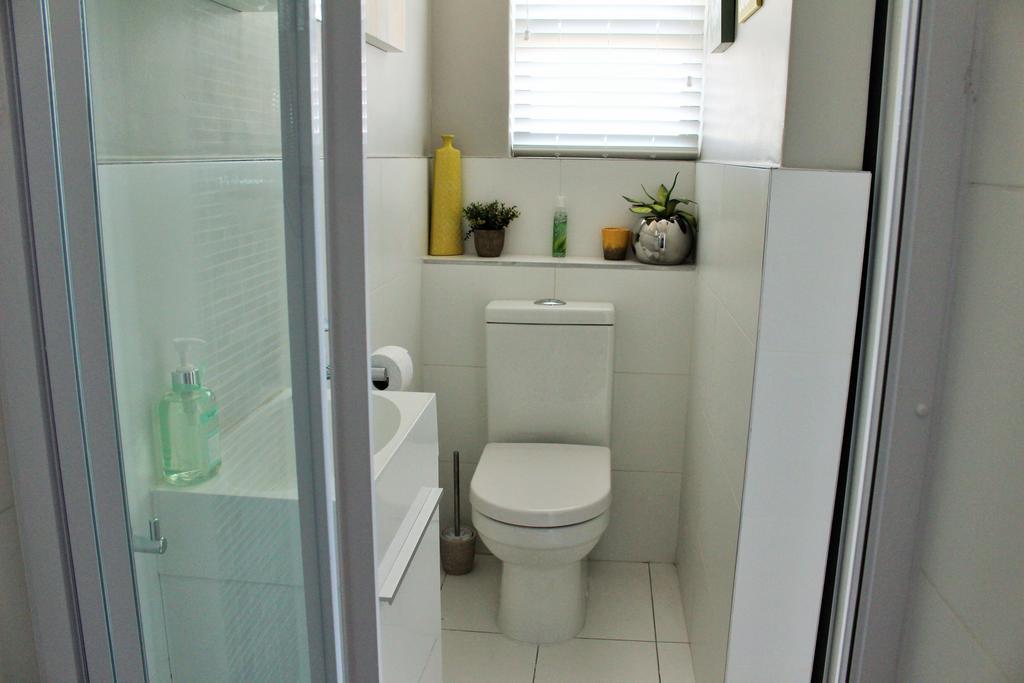 בלוברגסטראנד Blouberg Beachfront Apartment חדר תמונה
